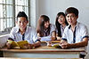 Group of Vietnamese students looking at the camera