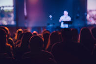 Audience Watching Blurred Speaker
