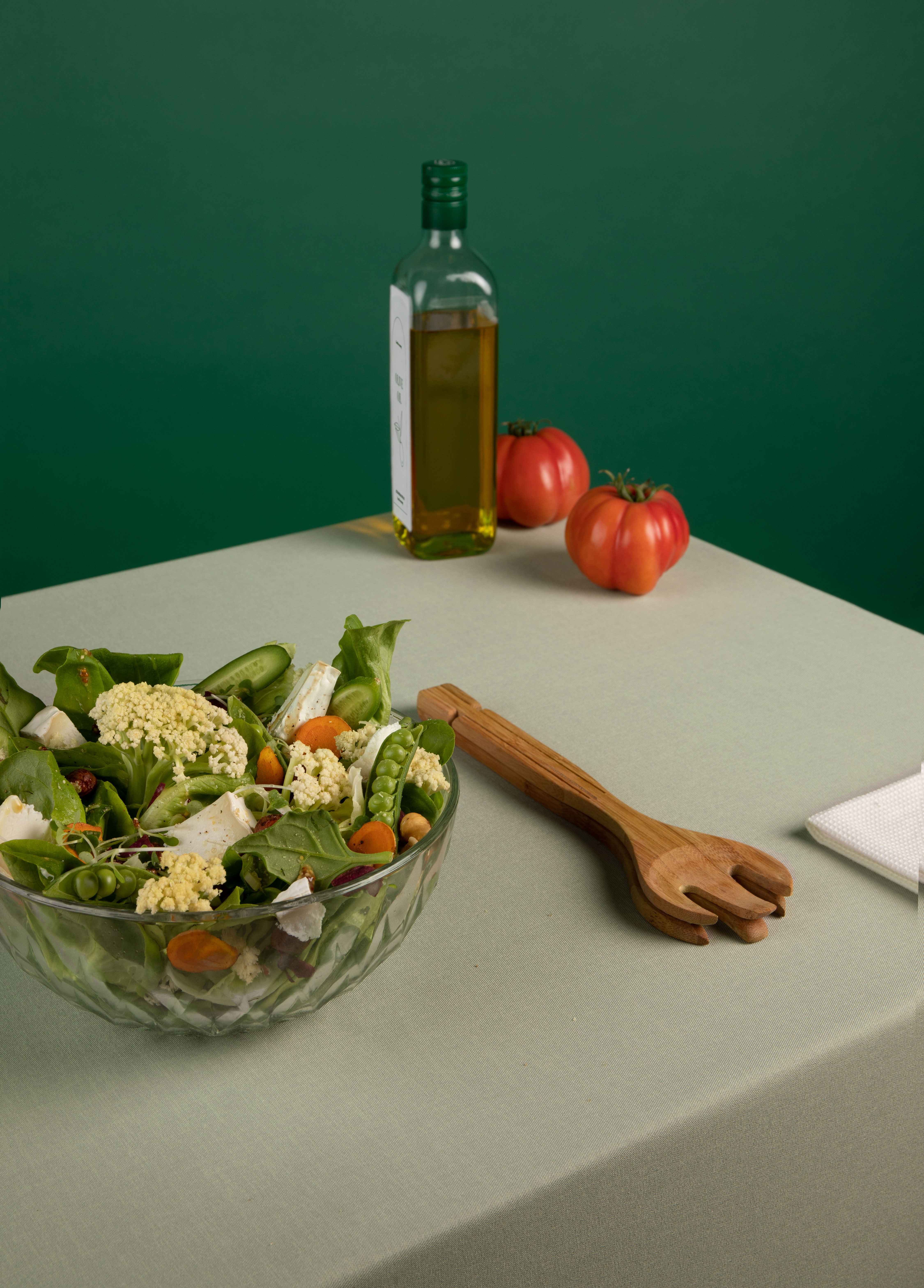 1. Preheat oven to 400°F (200°C). 2. Chop vegetables, toss with olive oil, salt, and pepper, and roast for 20 minutes. 3. Cook quinoa according to package instructions and let cool. 4. Combine quinoa and roasted vegetables in a bowl. 5. Drizzle with lemon juice, add chopped parsley, and toss gently.