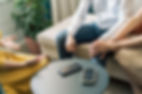 Three business people are talking in the office. The psychologist is talking to the patient