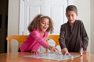 Children playing a board game