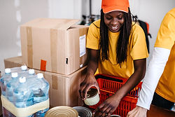 Volunteer Sorting Donations