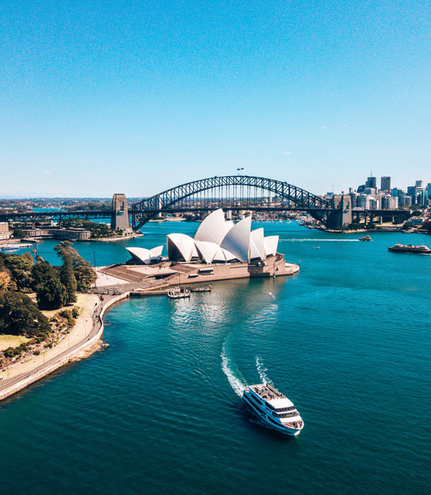 Sydney Opera House and harbor aerial view in Sydney Australia, luxury Oceania travel, iconic Australian landmarks and coastal city skyline.