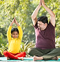 Father and child meditating