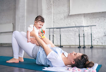 Mother and baby exercising