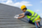 A professional installing a slate roof