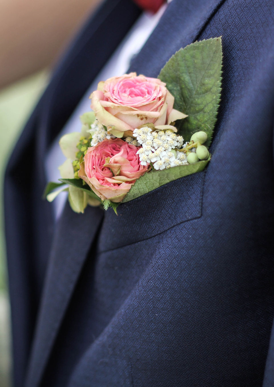Wedding Photography by Blake Ferguson showcases the details of the Groomsmen’s boutonnière in Ontario, Canada.