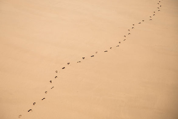 Traces de pied sur le sable