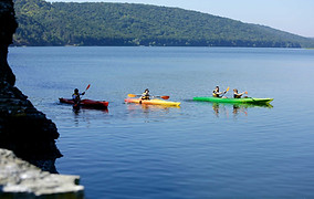 Kayakers on calm lake