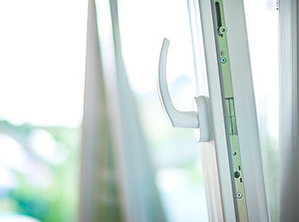 Opened white plastic window with tilt mechanism