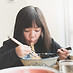 Girl Eating Noodles