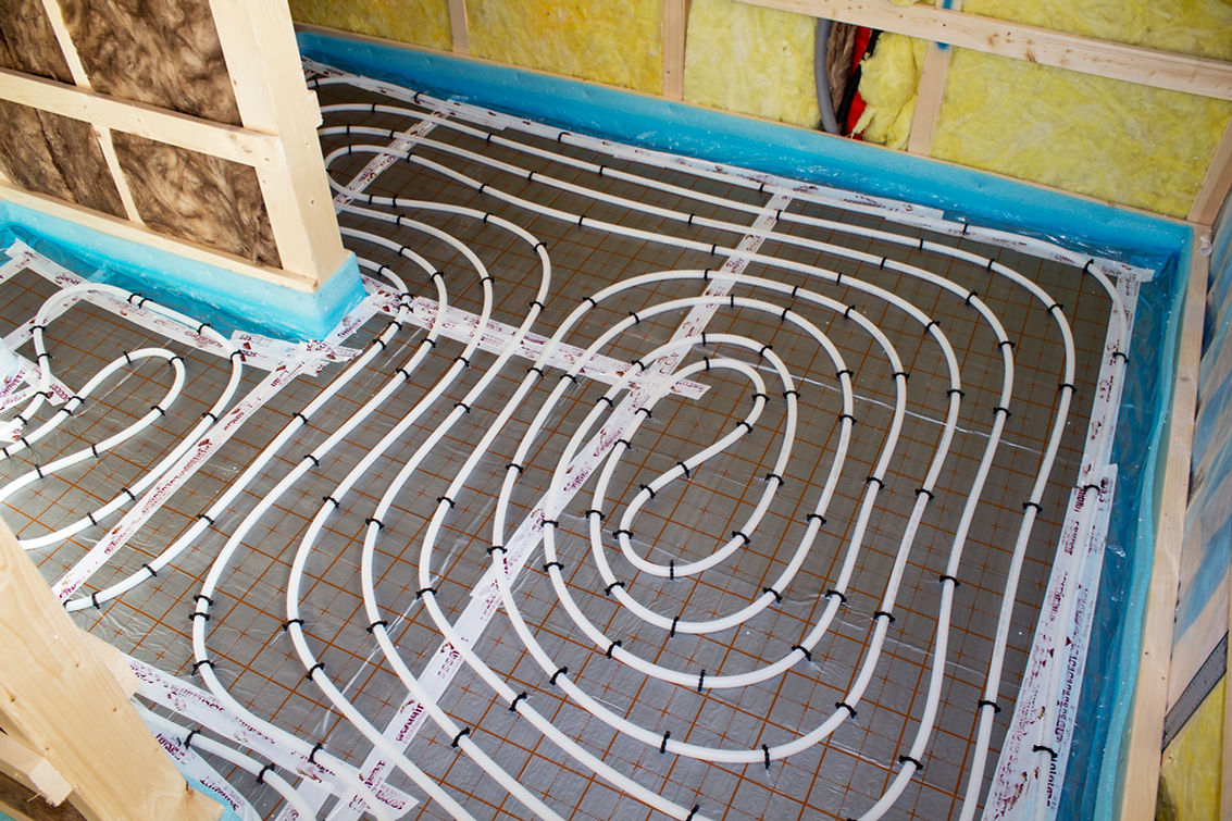 Underfloor heating pipes installing in a room
