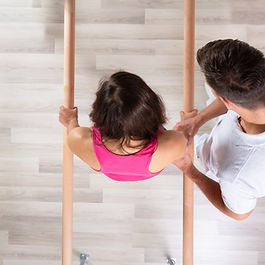 Woman getting help from physiotherapist