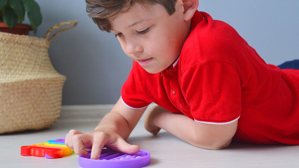 Close-up view of a sensory corner with soft lighting and calming sensory toys