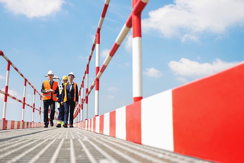 Workers Wearing Helmets and Jackets