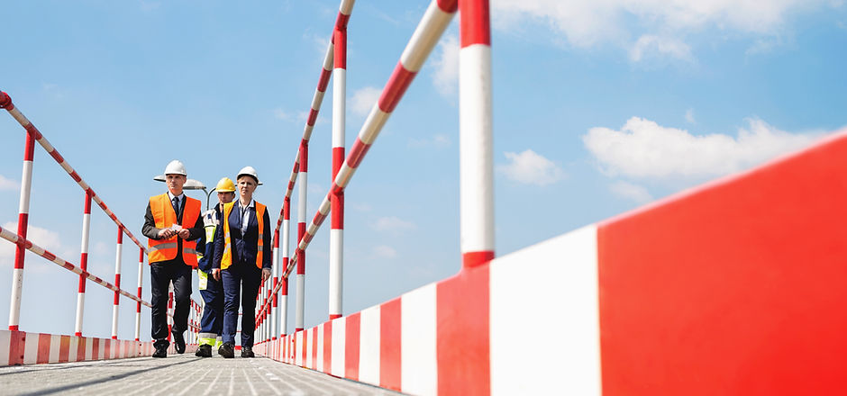 Workers Wearing Helmets and Jackets