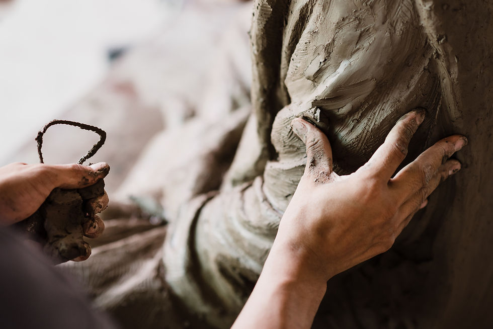 Hands Sculpting Clay