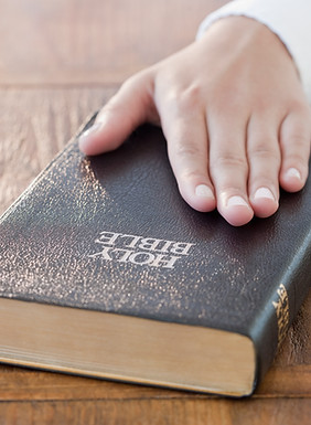 Hand on Bible