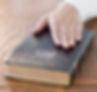 Hand on Bible