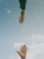 Reaching Hands Skyward