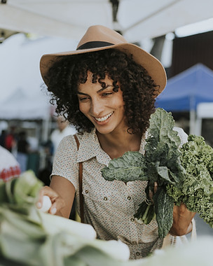 Woman Buying Kale