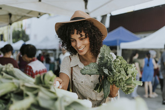 Woman Buying Kale