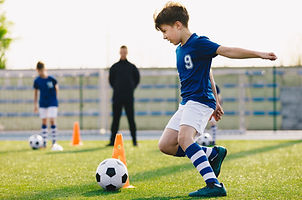 Boy playing football