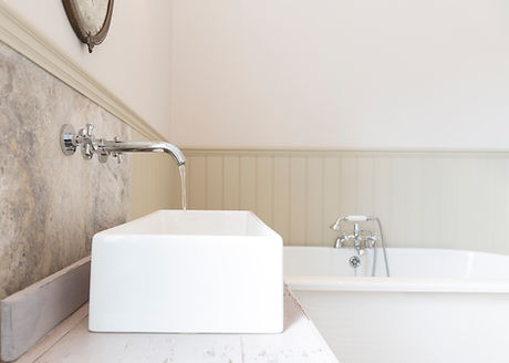 Sink and bathtub in luxury bathroom