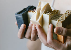 Handmade bar soaps in hands