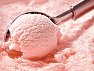 strawberry icecream being scooped