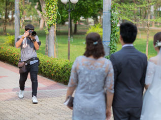 A Photographer taking a picture in the Old Market in Omaha,NE