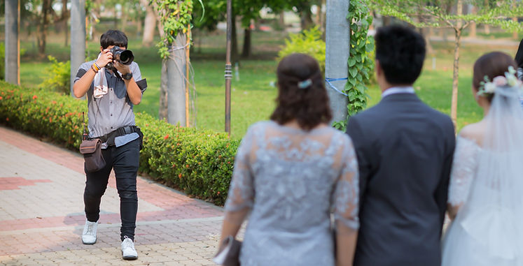 A practical guide to choosing a wedding photographer, covering how to evaluate style, portfolios, and pricing before committing to a booking.