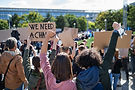 Protesters Holding Signs