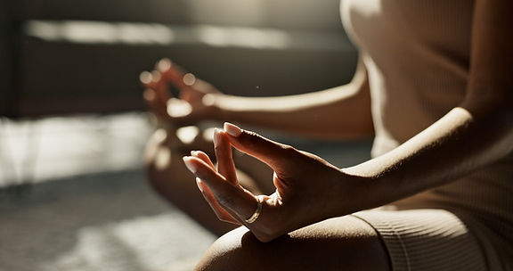 Woman Meditating Indoors