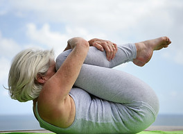 Person holding a yoga pose