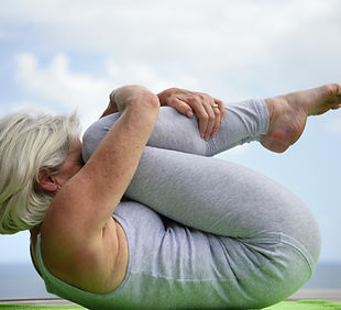 Person holding a yoga pose
