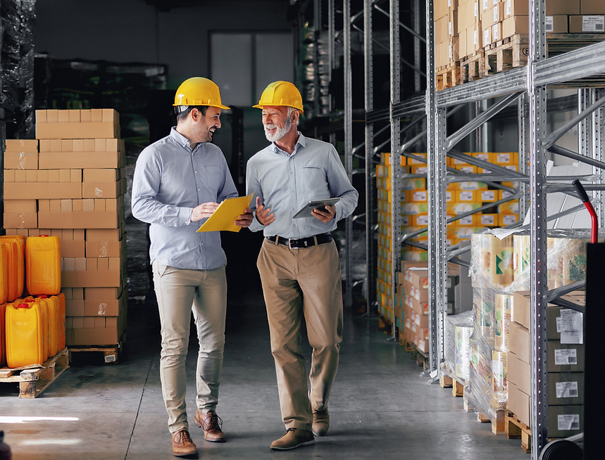 Warehouse Workers Discussing