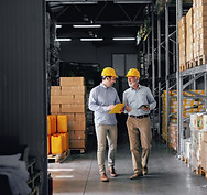 two senior discussing the right equipment for their company