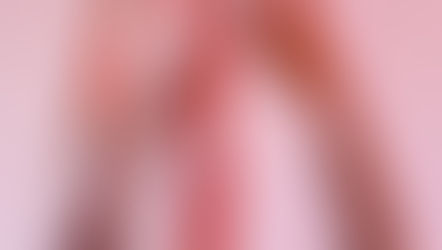 woman laying on her back with her arms and legs up