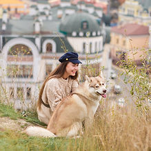 Woman with husky outdoors