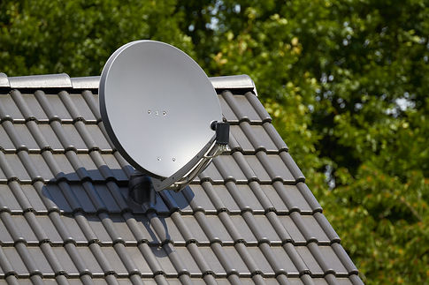 Satellite dish on the roof of a house