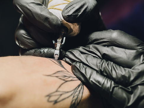 Artist Making Tattoo