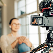 Female influencer recording a video