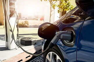 Electric car charging at power station