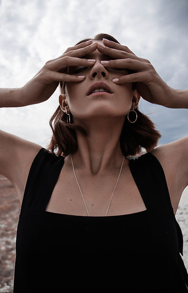 Woman Covering Eyes