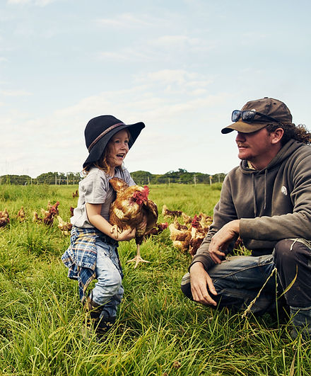 Father and Son in Chicken Farm