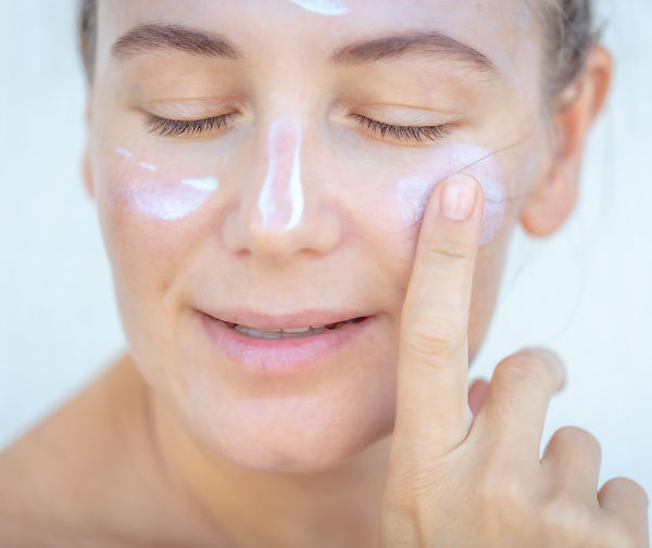 Applying Face Cream