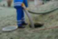 Emptying household septic tank. Cleaning sludge from septic system