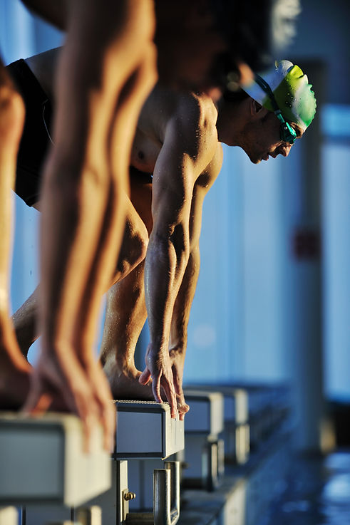 Swimmers At Starting Blocks