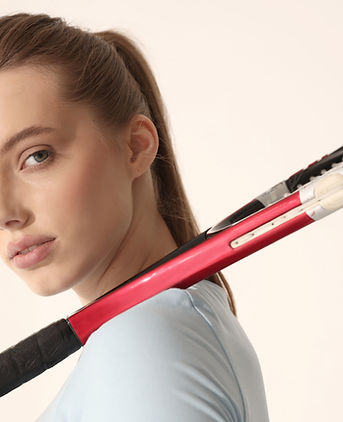 Woman holding tennis racket